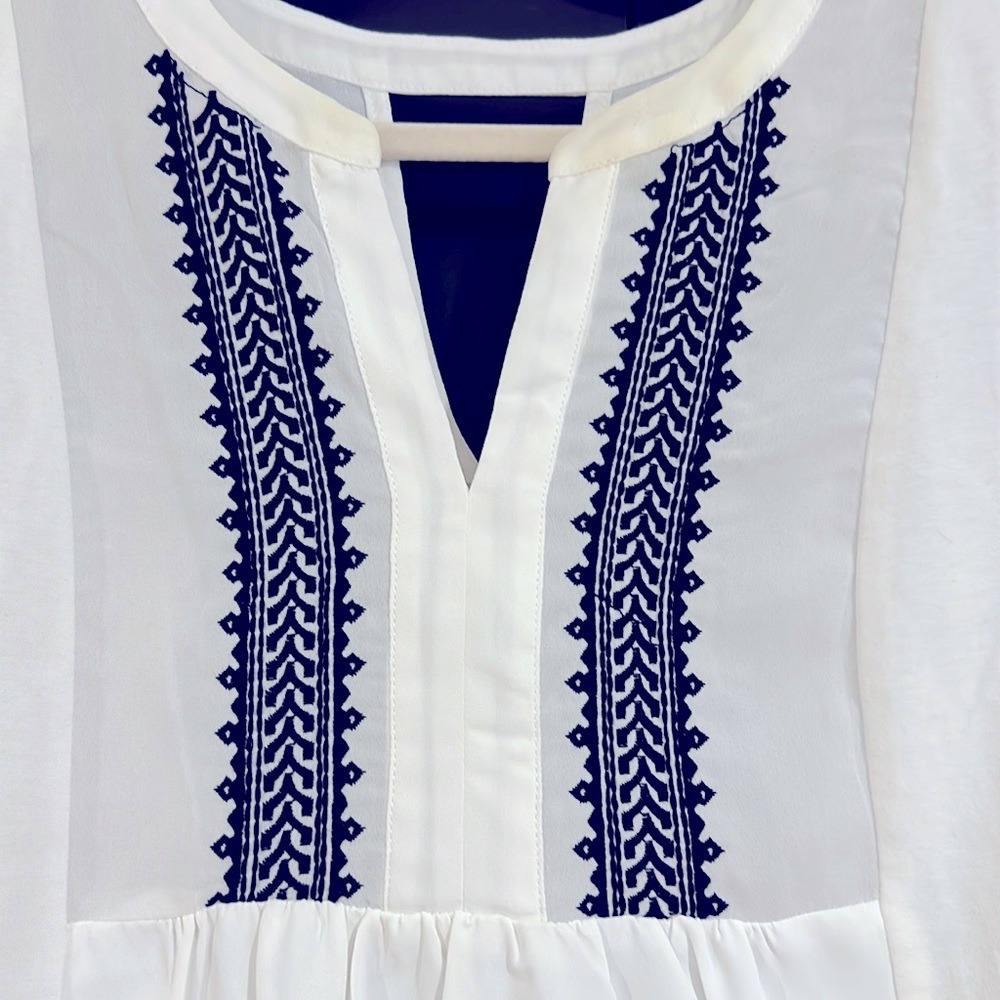Brand new never worn! White float tank top with blue stitching. - Picture 2 of 7
